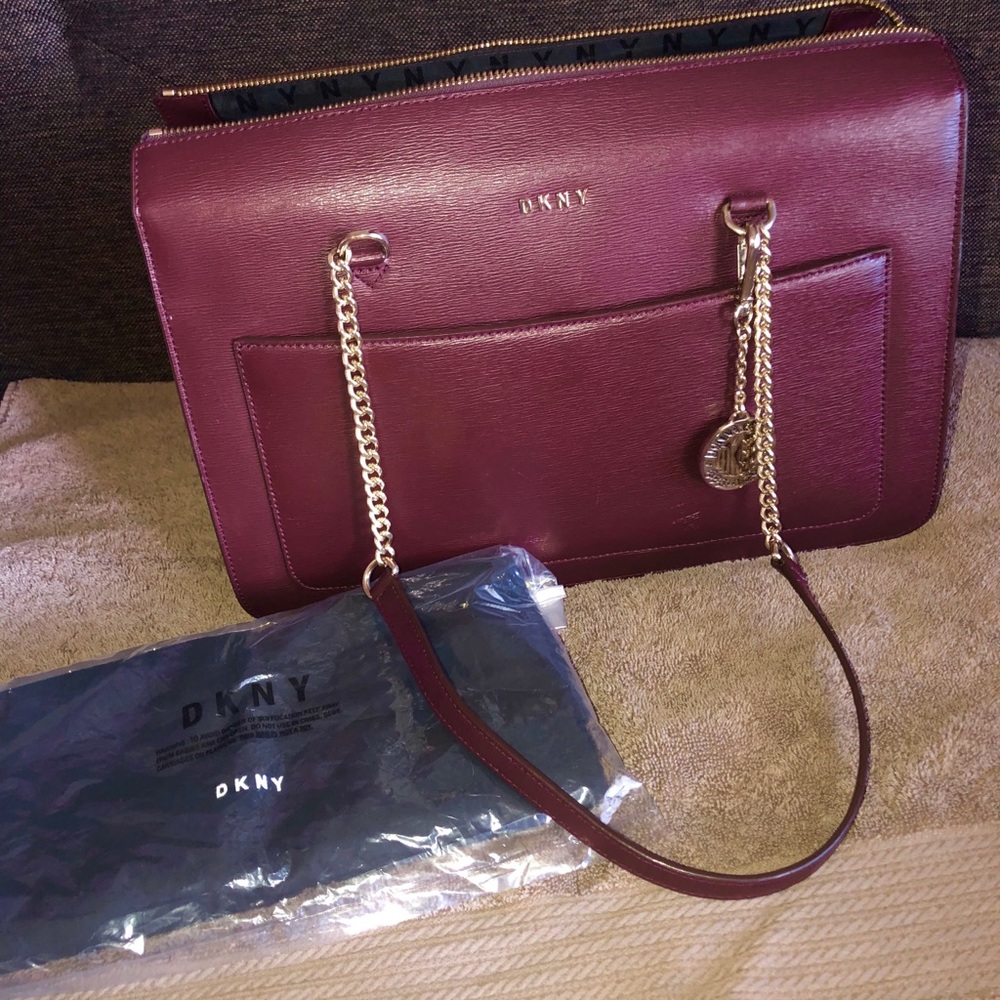 DKNY maroon shoulder purse.